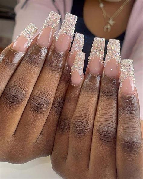 Diamond nails pearl ms - 50. Pink, Purple, and Silver Nails. Source: ksusha_perwushina – instagram.com. This is a shorter cut nail design, and it uses a light pale pink base coat, where each pinkie is painted with a silver glitter nail polish, and the middle finger on each hand is covered with silver and purple gemstones.